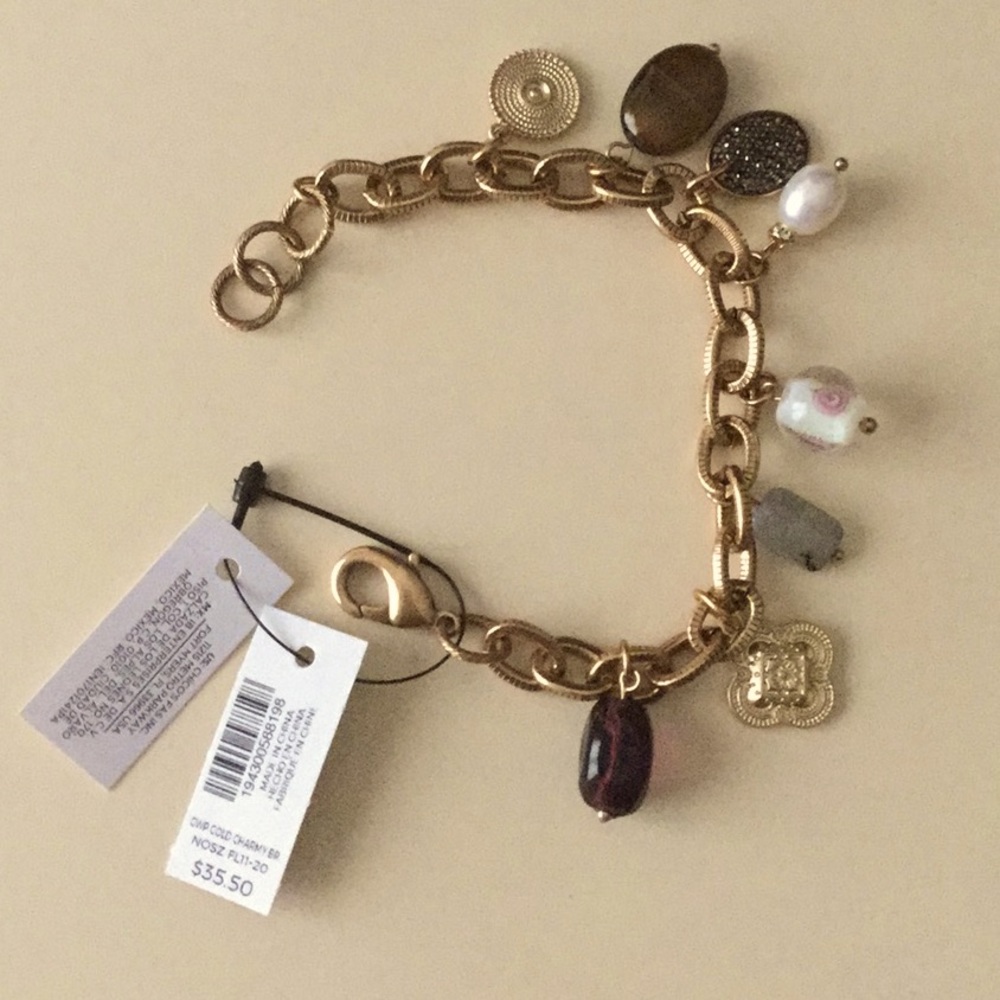 NEW-with tag. Gold Charm Bracelet-Costume Jewelry.